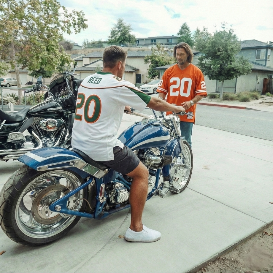 Two men with a motorcycle in a suburban setting
