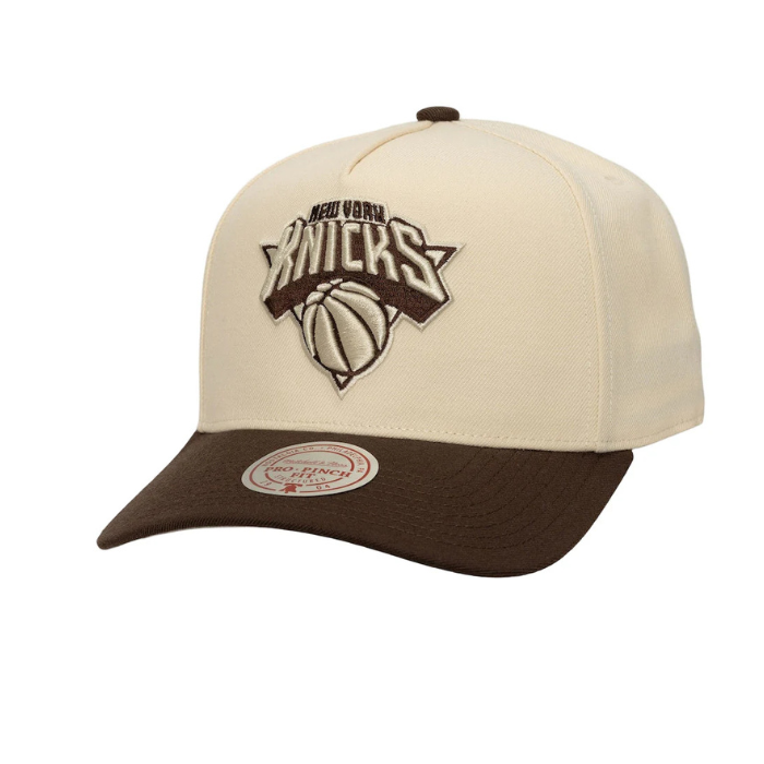 Beige and brown cap with New York Knicks logo on a white background